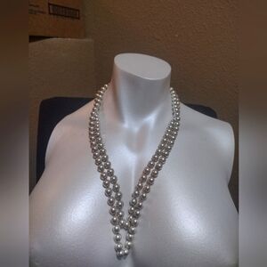 Long pearl style necklace